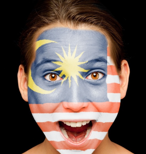 17601335 – portrait of girl with malaysian flag painted on her face 17601335 - portrait of girl with malaysian flag painted on her face